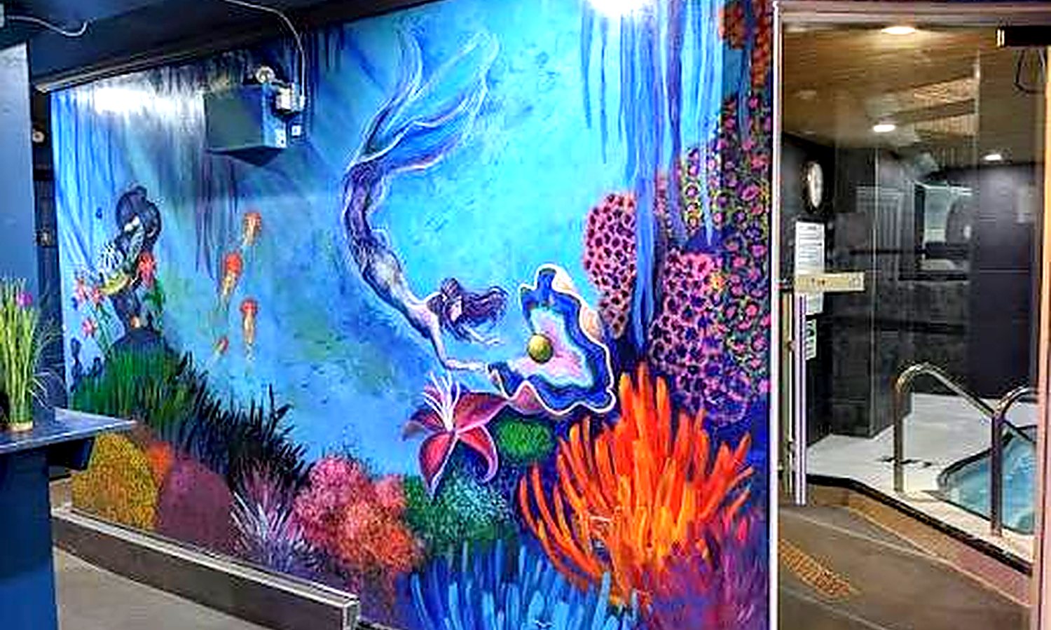 The mermaid mural at Oasis